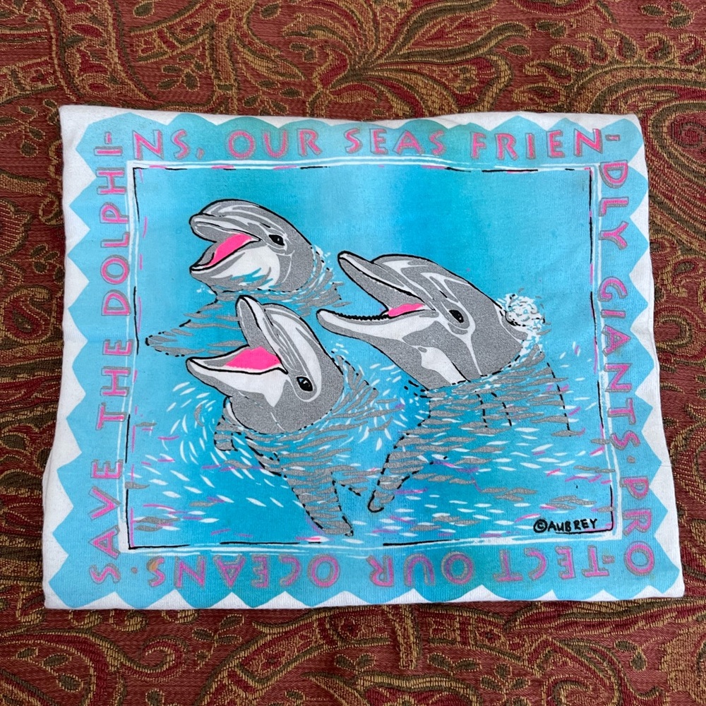 Save The Dolphins White Tee in M, L & XL.